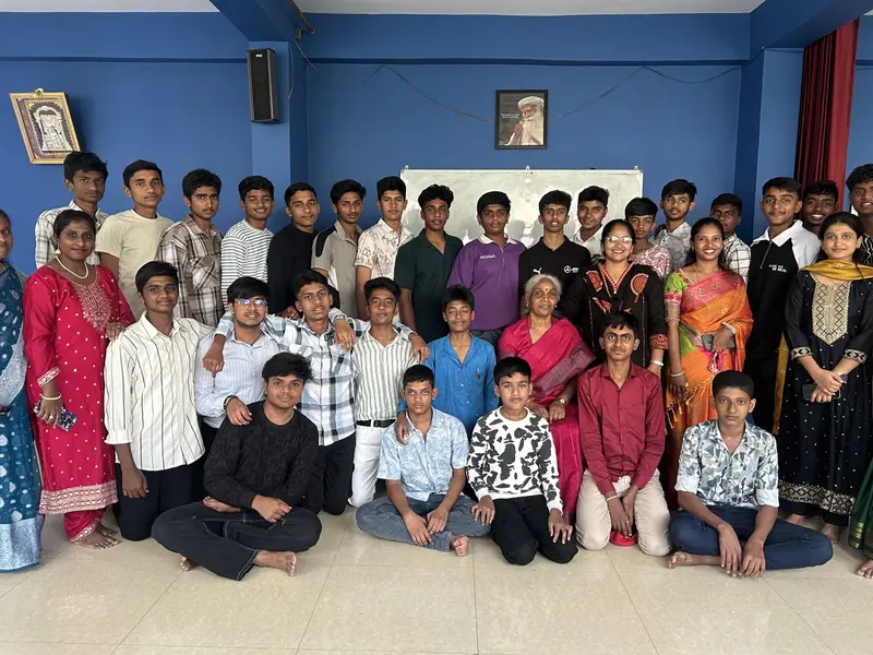 STC students with their teachers in an STC classroom