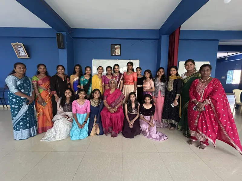 STC students and teachers together in a classroom